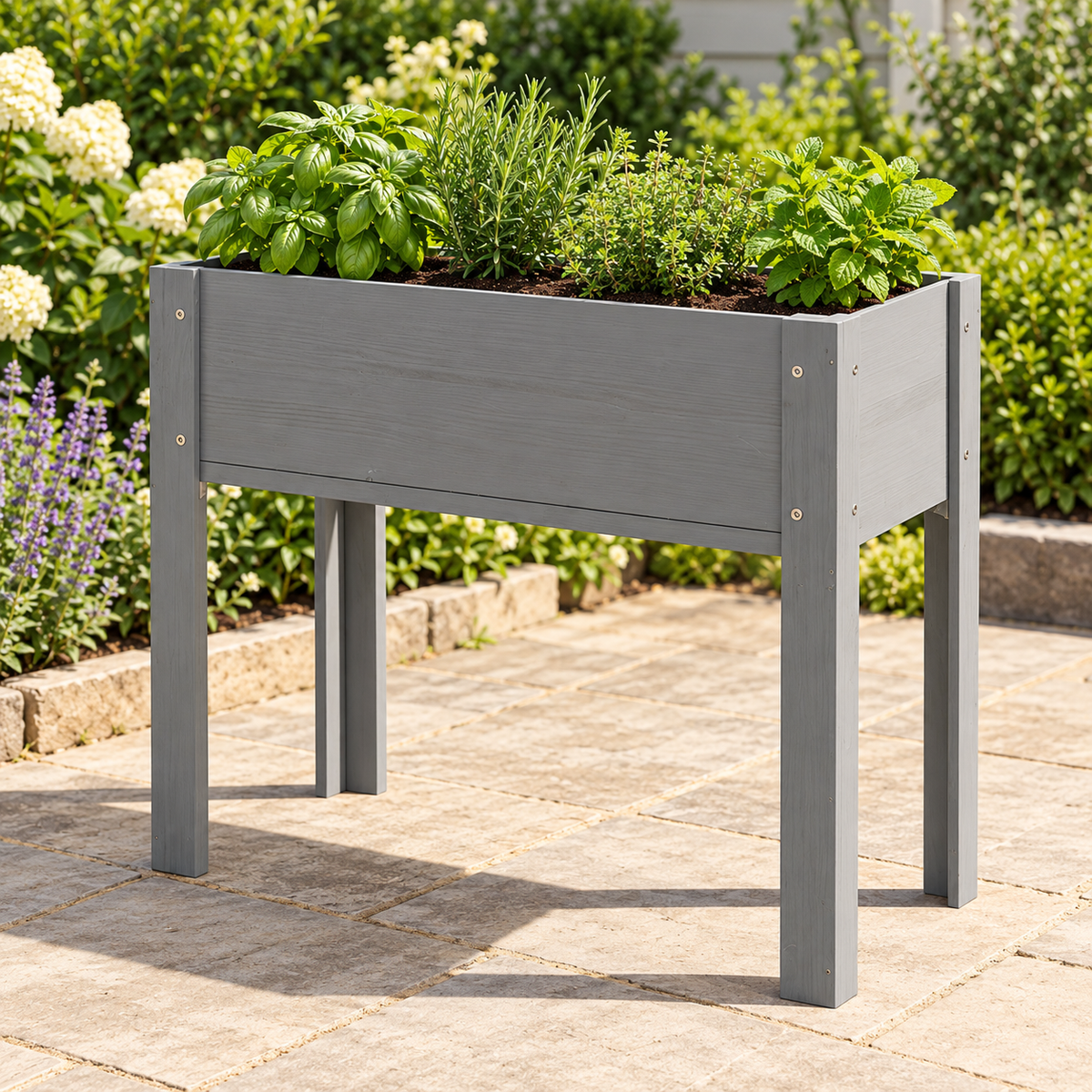 31-Inch Elevated Wood Planter Box with Legs, Gray, on a patio with herbs