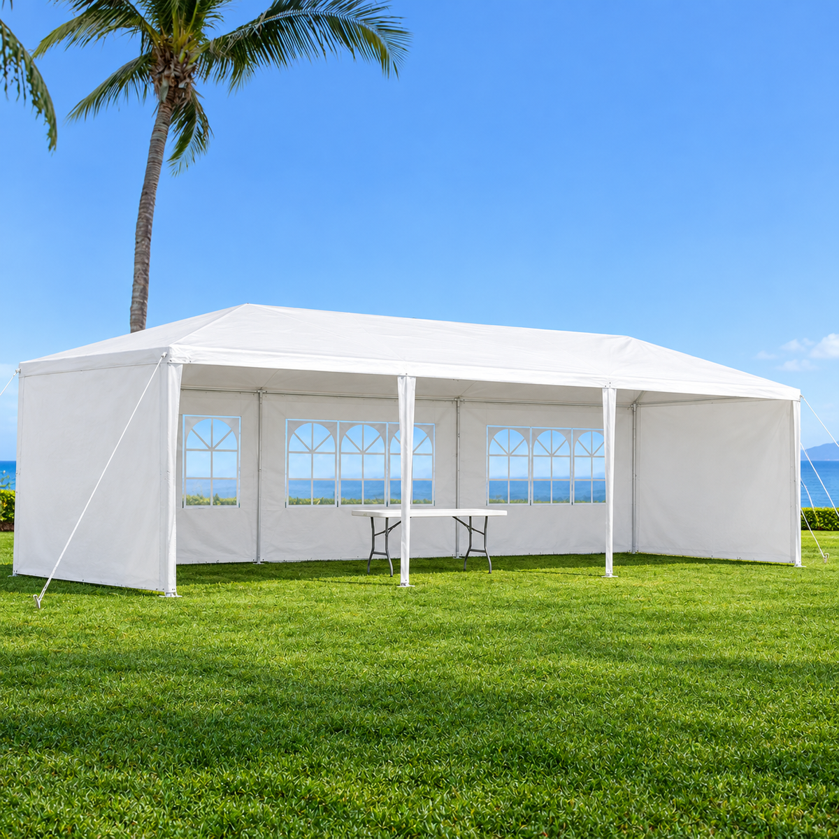 10 × 30-ft. Party Canopy with 5 Sidewalls, White, on an open lawn