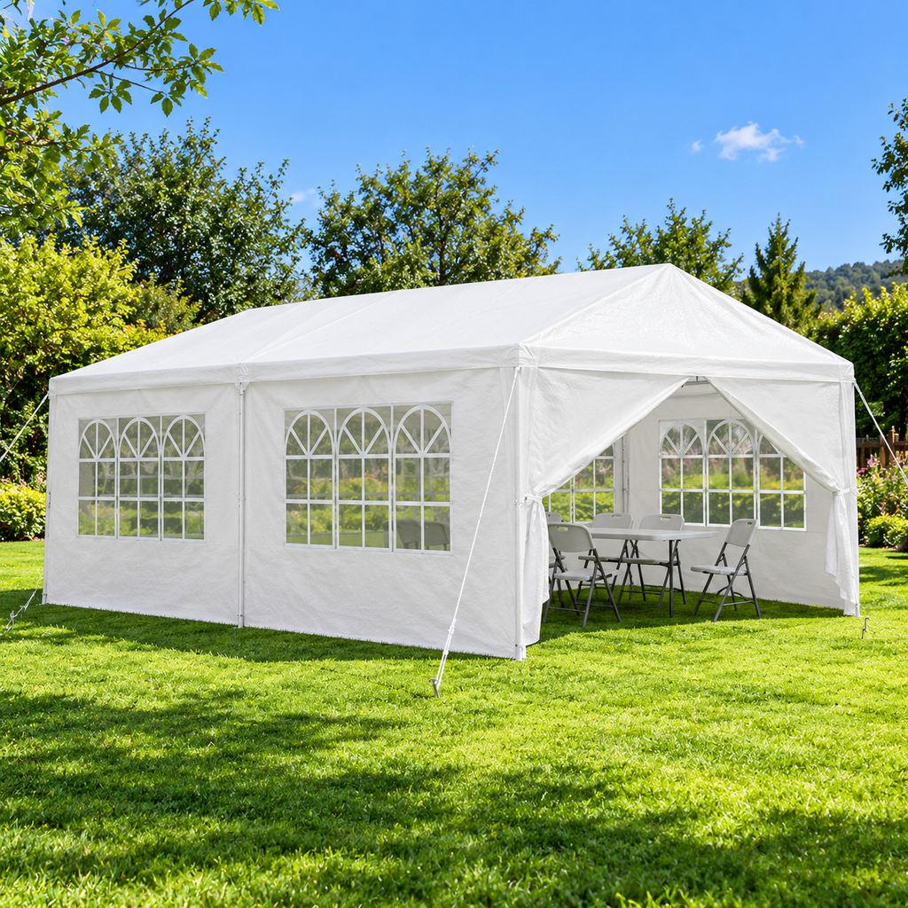 10 × 20-ft. Party Canopy with 6 Sidewalls, White, on a garden lawn with folding chairs inside