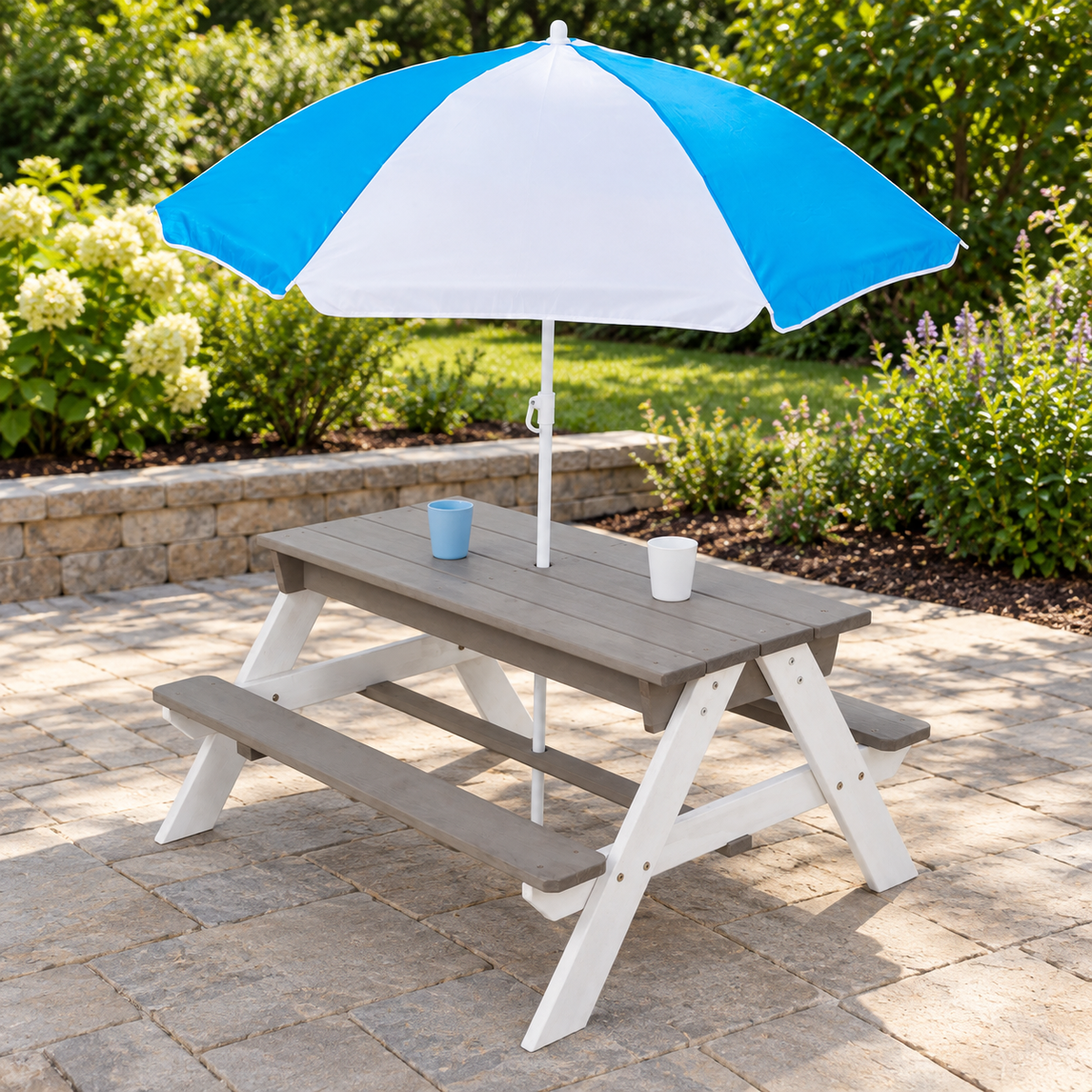 3-in-1 Kids Wood Picnic Table with Umbrella, Gray and White, on a patio with tabletop covers installed