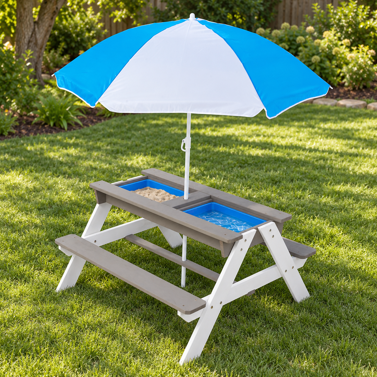 3-in-1 Kids Wood Picnic Table with Umbrella, Gray and White, on a lawn with the two play tubs exposed