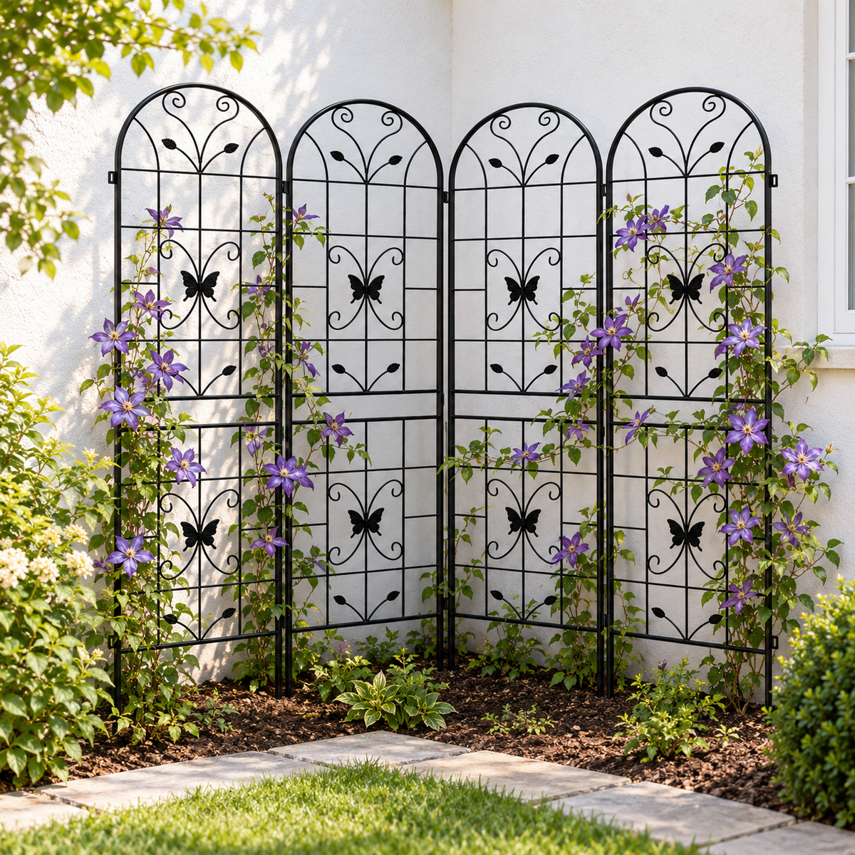 86.7-Inch Metal Garden Trellis, 4-Pack, Black, in a courtyard garden with climbing vines