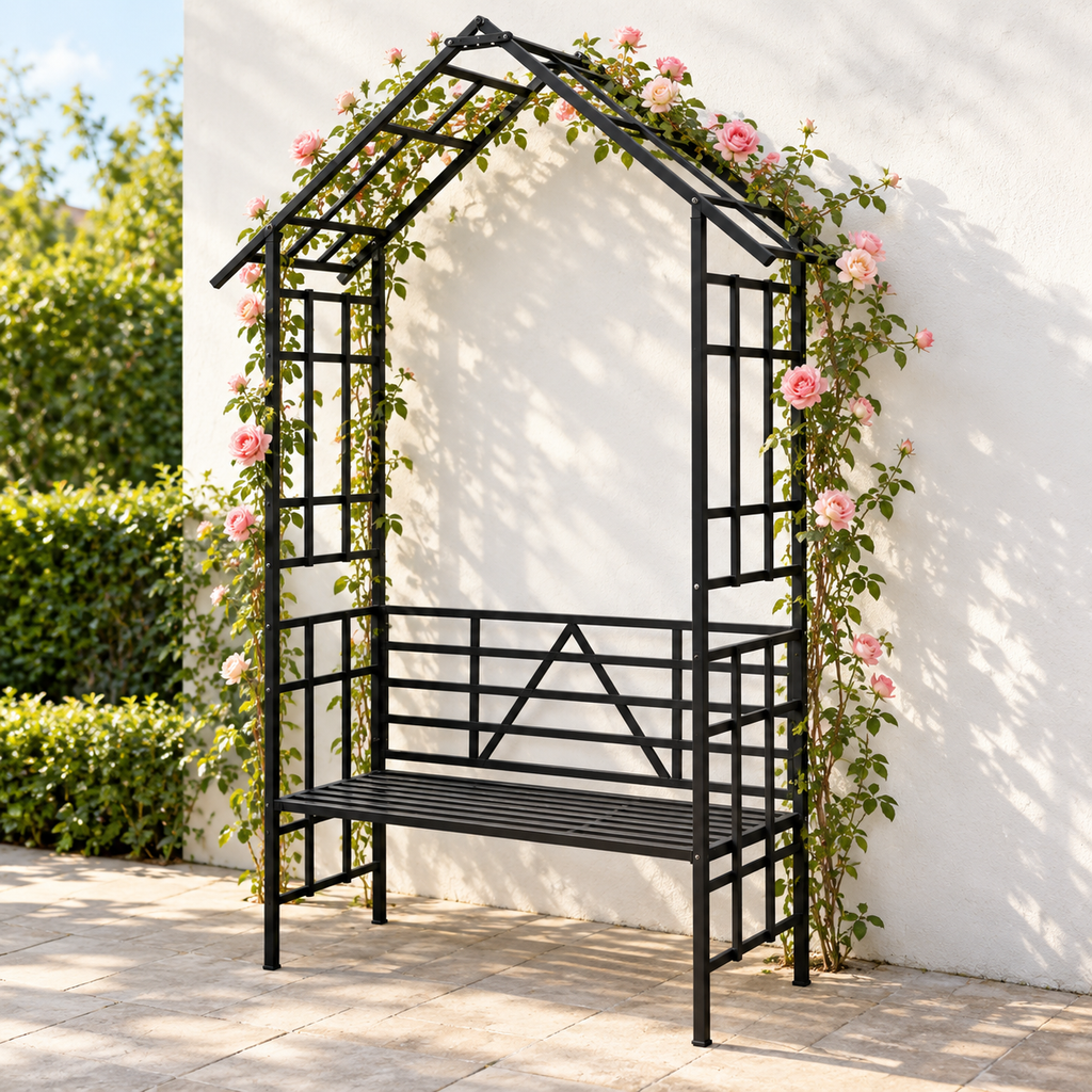 97-in. Gabled Iron Garden Arbor with Bench, Black, on a garden patio with climbing roses
