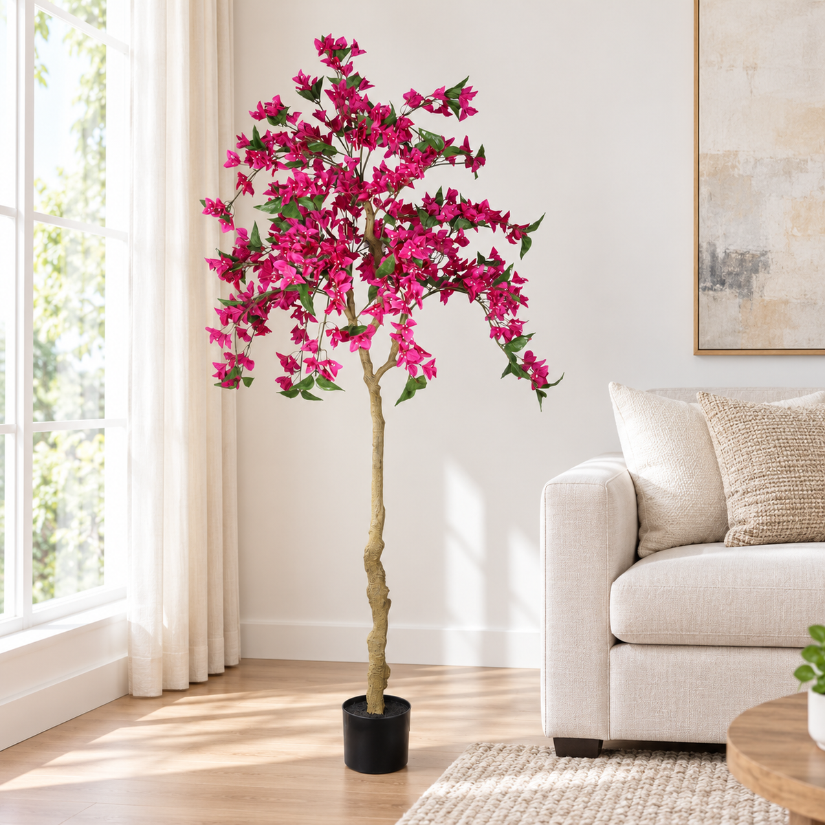 6-Foot Artificial Bougainvillea Tree, Dark Pink, beside a sofa in a living room